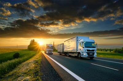 Trucks are moving in the evening view